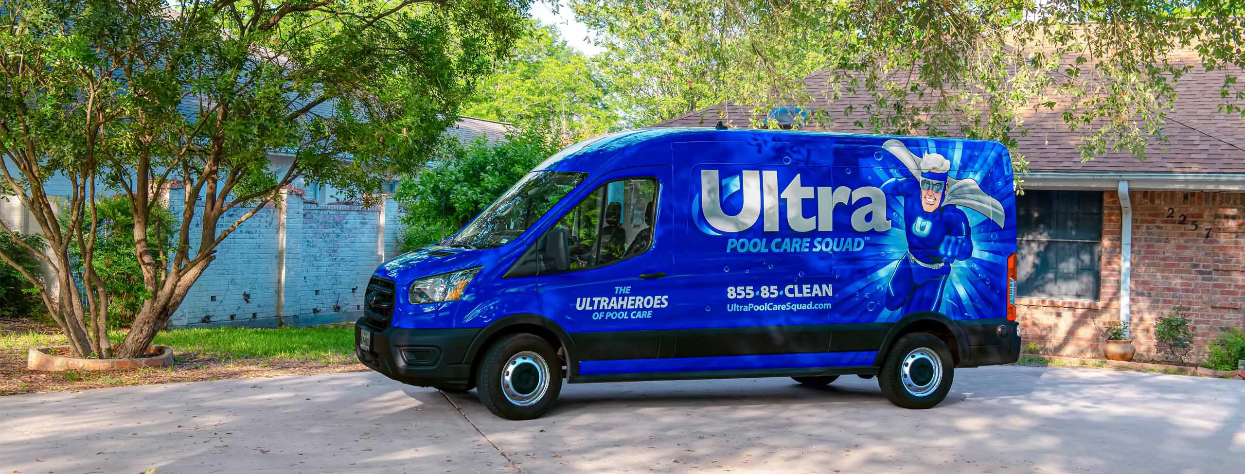 Ultra Pool Care Squad van parked during a pool cleaning service near you